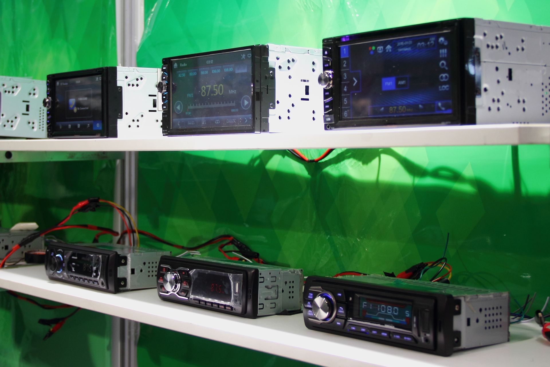 Sensor panel standard and double size multimedia car stereo radio – automotive accessories on shelves in showroom on green background
Sensor panel standard and double size multimedia car stereo radio – automotive accessories on shelves in showroom on green background